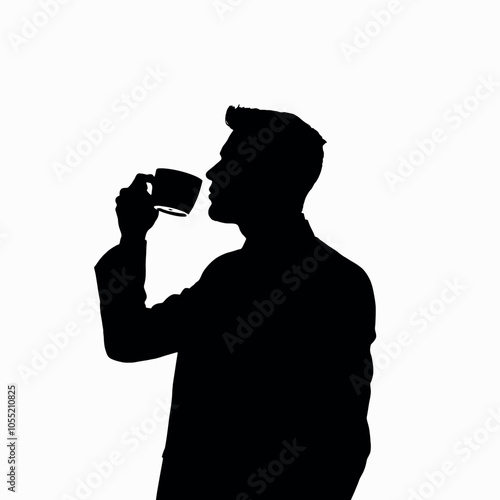 A businessman silhouette standing and drinking coffee, with one hand holding a coffee cup near his mouth
