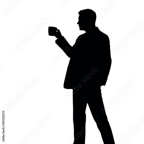 A businessman silhouette standing and drinking coffee, with one hand holding a coffee cup near his mouth