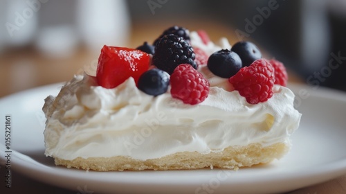 Slice of Pavlova with Whipped Cream and Berries