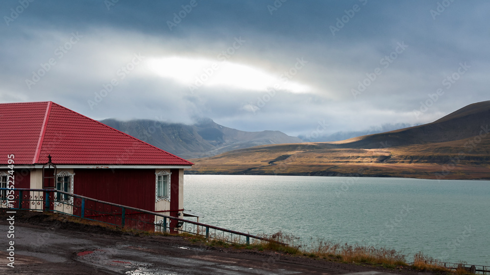Exploring Barentsburg in Svalbard A quiet moment by the water at dusk Exploring Barentsburg in Svalbard A quiet moment by the water at dusk