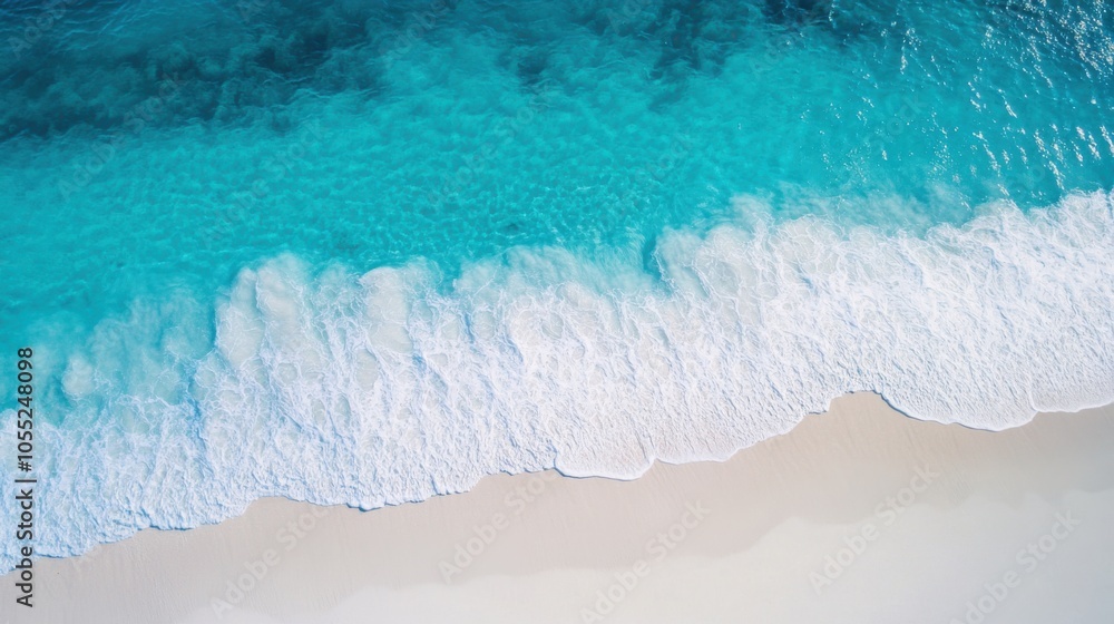 An aerial view of a pristine beach with turquoise waters, showing the contrast between An aerial view of a pristine beach with turquoise waters, showing the contrast between