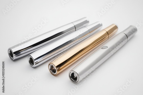 Vaping Devices. Electronic Cigarettes and Metal Devices in White Background