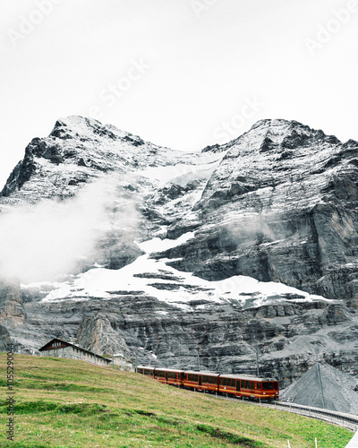 Red Train Journey Through Spectacular Mountain Scenery in Swiss