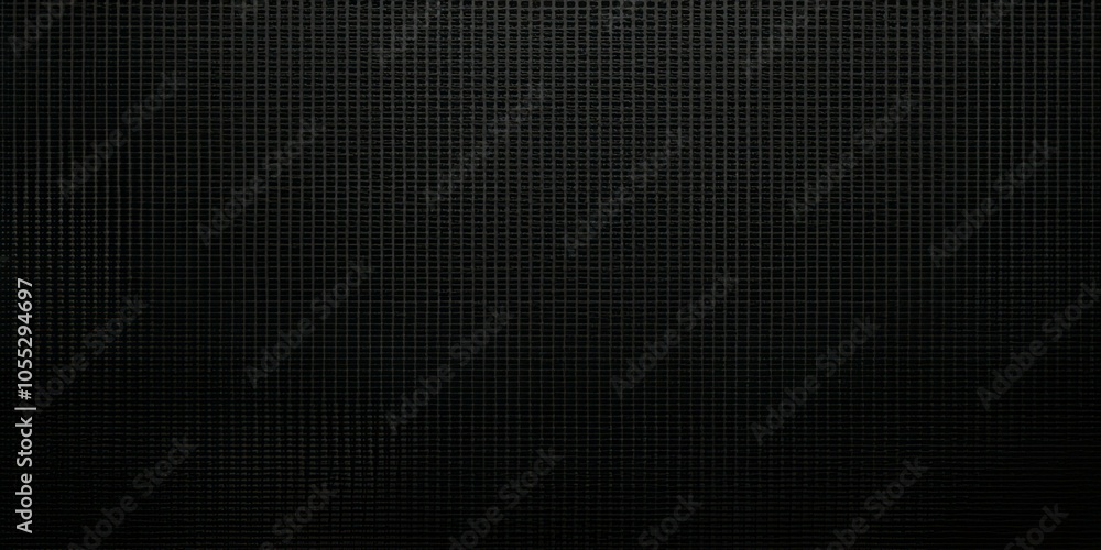 Black Perforated Metal Sheet With Tiny Circular Holes Creating A Uniform, Grid-Like Texture