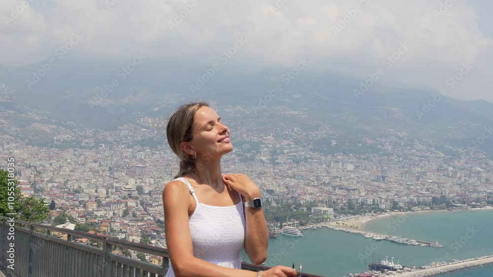 Young woman enjoying Alanya view Young woman enjoying Alanya view