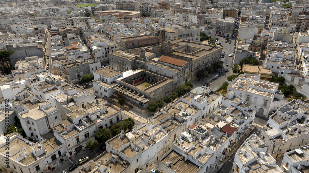 Aerial view of the Maria Santissima Annunziata (Most Holy Annunciation) church located in Ostuni in the province of Brindisi, in Puglia, Italy. Aerial view of the Maria Santissima Annunziata (Most Holy Annunciation) church located in Ostuni in the province of Brindisi, in Puglia, Italy.