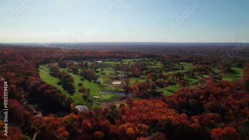 Incredibly gorgeous golf course in golden fall forest, 4K photo