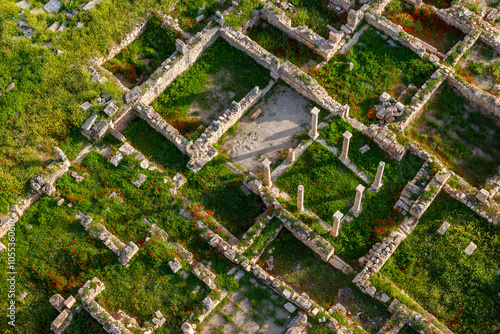 Aerial view of ancient ruins and stone structures surrounded by greenery, Pamukkale, Denizli, Turkey. photo