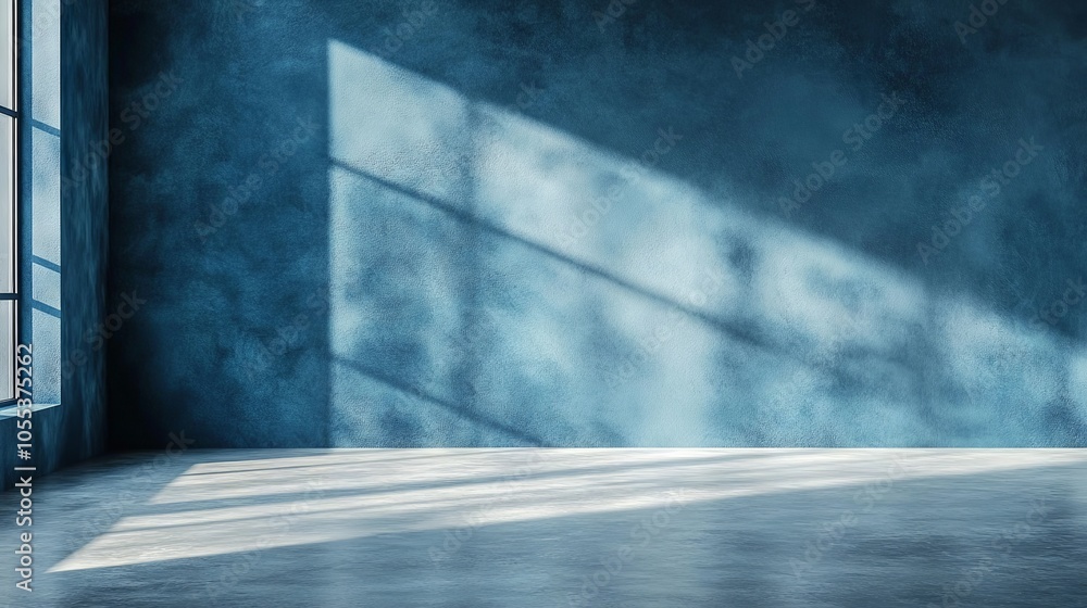 Blue wall in an empty room with concrete floor - perfect for interior design, architectural projects, and modern decor Blue wall in an empty room with concrete floor - perfect for interior design, architectural projects, and modern decor