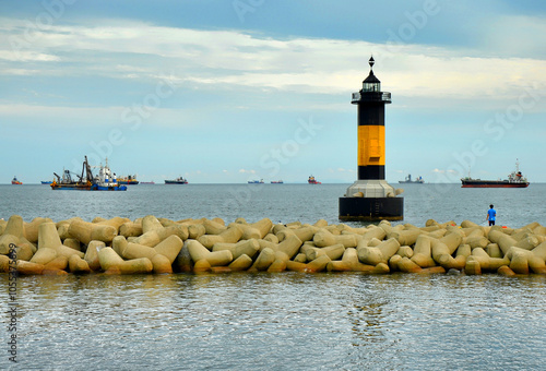 Tablou pe pânză Lighthouse and breakwatersi in Songdo beach, Busan, South Korea.