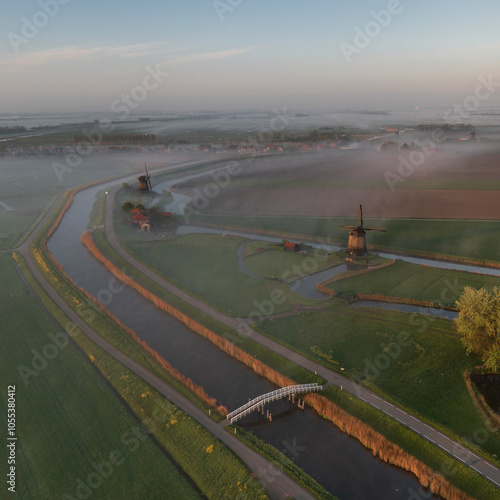 Aerial view of windmills in the countryside of Schermerhorn, Alkmaar, The Netherlands... photo