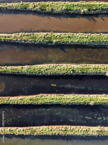 Aerial view of abstract pattern from a lagoon along the Tagus river in Corroios, Setubal, Portugal. photo