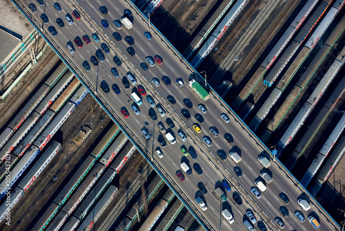 Aerial view of busy urban landscape with cars and trains on roads and bridges, Moscow, Russia. photo