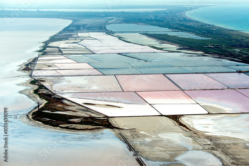 Aerial view of sasyk sivash lake with colorful saline patterns and serene water, crimea, russia. photo