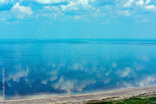 Aerial view of serene Lake Ebeity with tranquil reflections and picturesque clouds, Omsk Oblast, Russia. photo