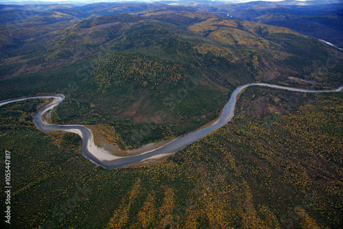 Aerial view of autumn siberian taiga with winding ob river and lush forest, Khanty Mansi Autonomous Okrug, Russia.