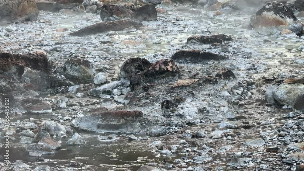 Natural Open Air Hot Springs, Steam is Coming from hot rocks and water surface
Natural Open Air Hot Springs, Steam is Coming from hot rocks and water surface