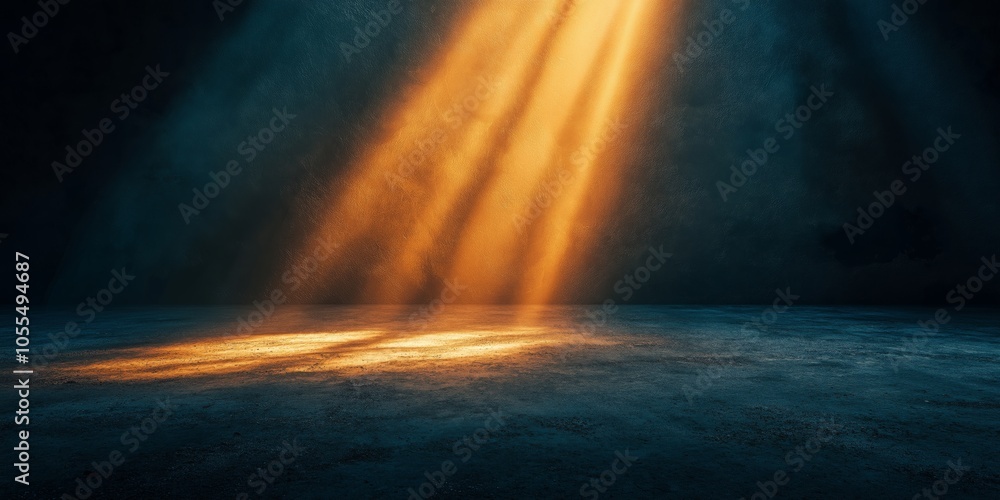 Golden sunbeams illuminate concrete floor in dark room. Dramatic lighting effect creates spotlight on grunge surface against deep teal background for product display Golden sunbeams illuminate concrete floor in dark room. Dramatic lighting effect creates spotlight on grunge surface against deep teal background for product display