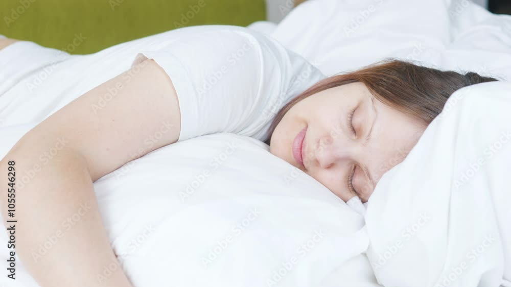 Young woman girl sleeping peacefully in bed in the morning. Close up. Young woman girl sleeping peacefully in bed in the morning. Close up.