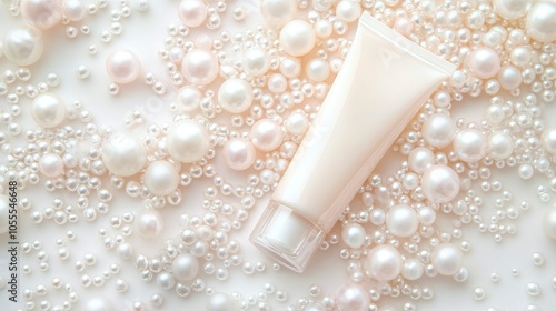 A tube of cosmetic cream or lotion set against a white pearl pastel confetti background, with plenty of copy space for your beauty blog or design.