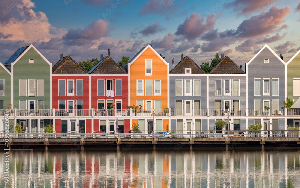 Reflection with houses on the lake in Houten Netherlands