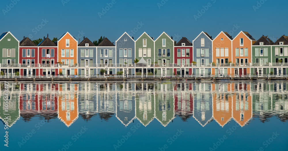 Reflection with houses on the lake in Houten Netherlands
