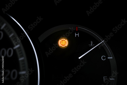 Car ABS warning light , Close up of ABS warning light blinking on car dashboard , car repair concept