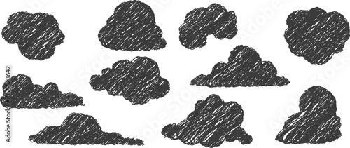 Hand drawn pencil drawing of clouds in black color. Kids sketch chalk drawing. Grunge image of the heaven. For design template art children education material.
