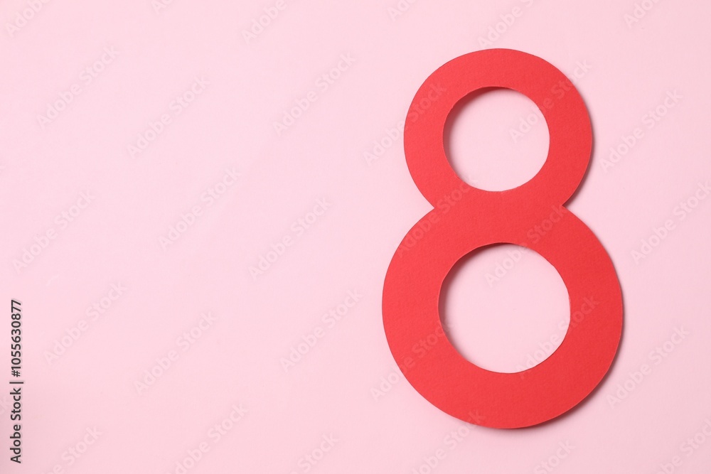 Number 8 on a color background. Minimal Women's day, March 8th or birthday concept. Flat lay, top view. Number 8 on a color background. Minimal Women's day, March 8th or birthday concept. Flat lay, top view.