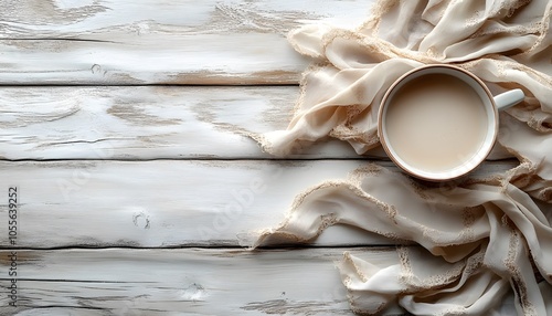 A coffee cup with a veil on a wooden table.  View from above.