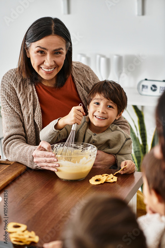 A joyful family enjoys baking together in their cozy kitchen, preparing for Christmas celebrations.