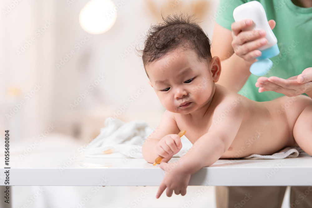After bath time, it's time to put on powder and get dressed After bath time, it's time to put on powder and get dressed
