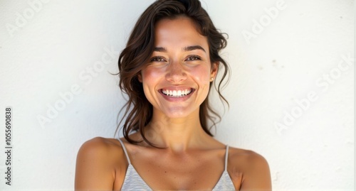 A Venezuelan woman with warm skin tones and a cheerful smile