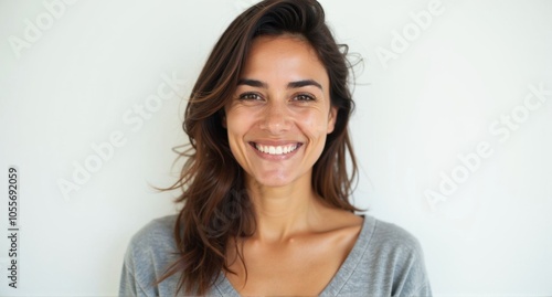 A Palestinian woman with smooth skin and a friendly expression