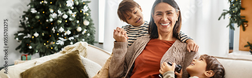 Photography Family members gather happily around their Christmas tree, sharing laughter and festive moments