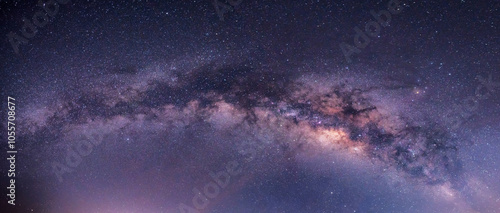 Panorama blue night sky milky way and star on dark background.Universe filled with stars, nebula and galaxy with noise and grain.Photo by long exposure and select white balance.