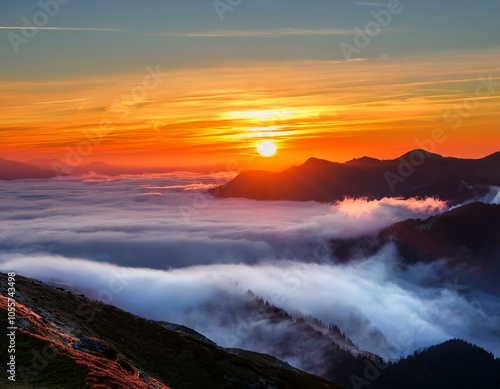 Colorful winter sunrise in the foggy mountains