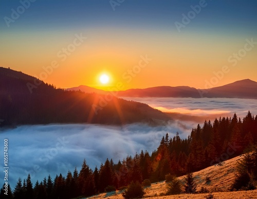 Colorful winter sunrise in the foggy mountains