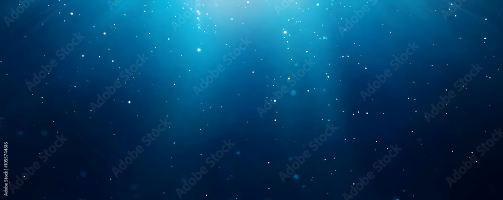 Fototapeta premium A serene underwater scene with light rays and floating particles creating a tranquil atmosphere.