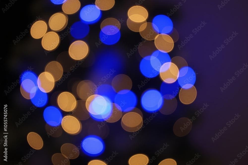 Vibrant blue and gold bokeh lights for festive atmosphere and creative background design Vibrant blue and gold bokeh lights for festive atmosphere and creative background design