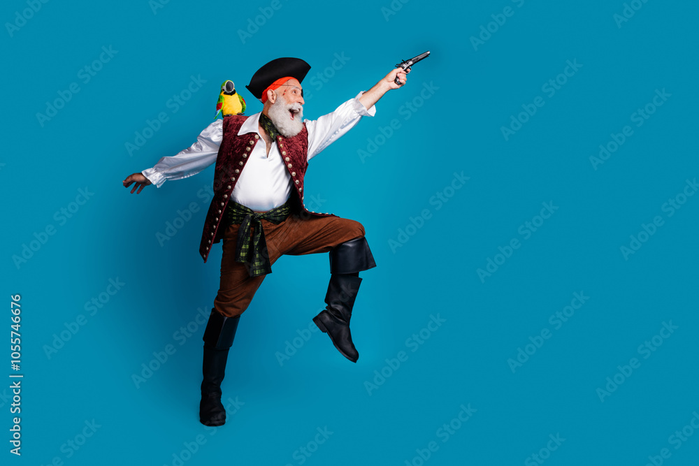 Photo of crazy bearded pirate wear costume celebrate halloween carnival fight isolated on blue color background Photo of crazy bearded pirate wear costume celebrate halloween carnival fight isolated on blue color background