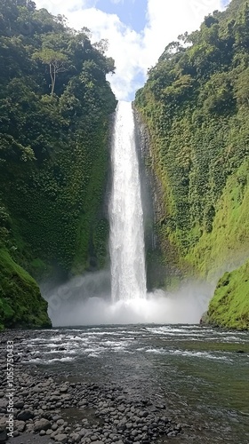 Majestic Waterfall with Lush Green Surroundings