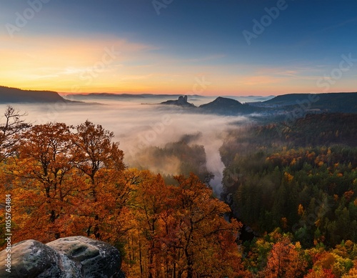 The beautiful autumn forests and sea of clouds sunrise of Singanense of China. photo