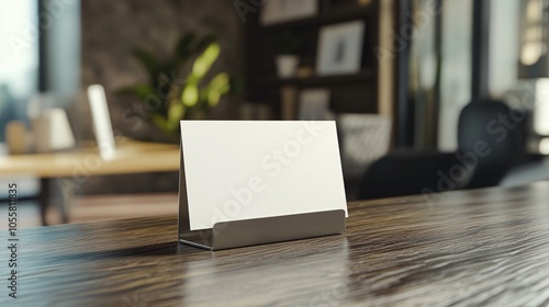 Modern desk with a blank sign holder, in a stylish office setting. Ideal for professional presentations or branding purposes.