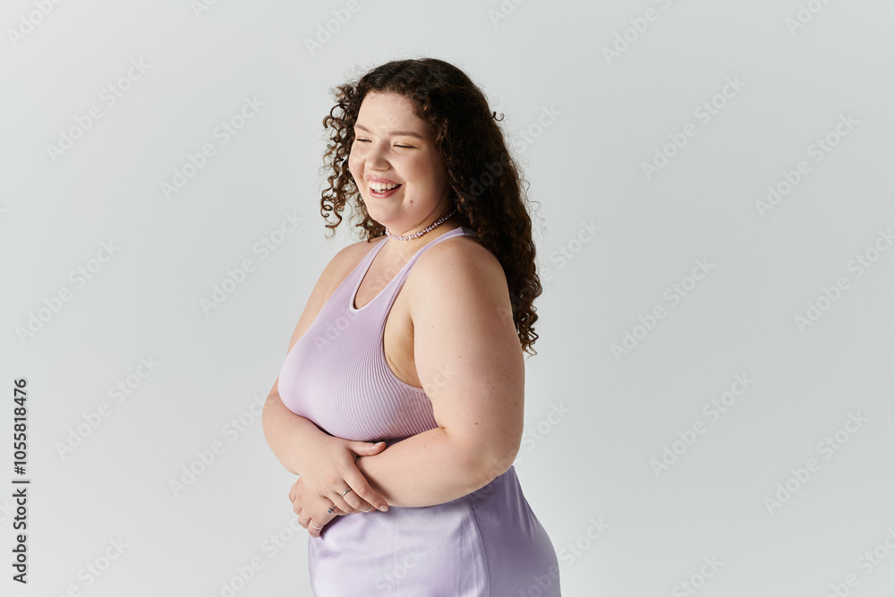 A joyful plus size woman smiles confidently while showcasing her elegance in a pastel dress. A joyful plus size woman smiles confidently while showcasing her elegance in a pastel dress.