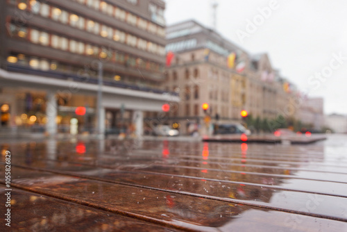 Photography Close up of a wet wooden bench in city