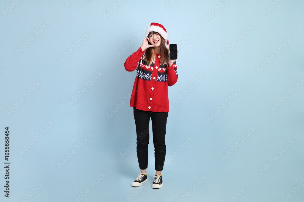 Woman wearing Santa hat Woman wearing Santa hat