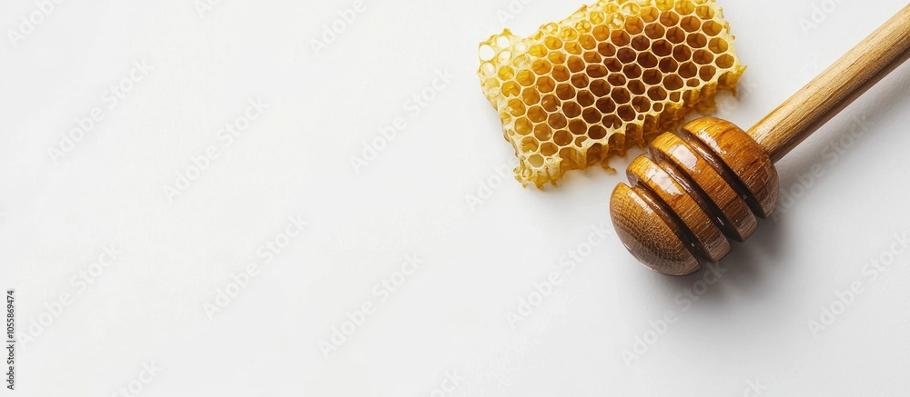 Raw Homey With Honeycomb And A Dipper Or Wooden Wand On A White Background With Copyspace For Medicinal And Food Concepts Raw Homey With Honeycomb And A Dipper Or Wooden Wand On A White Background With Copyspace For Medicinal And Food Concepts