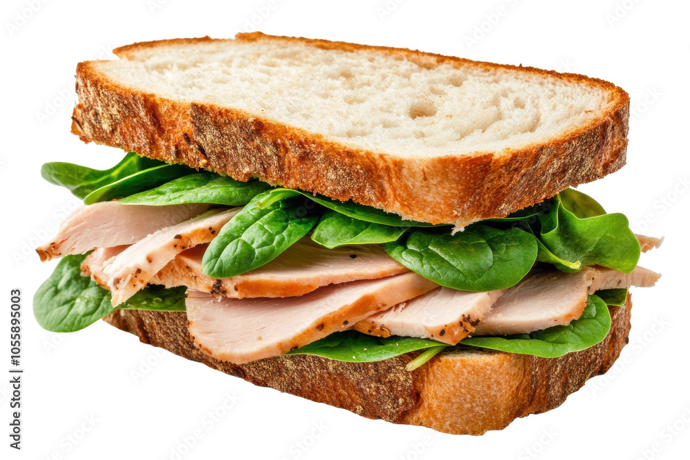 Freshly made turkey and spinach sandwich on whole grain bread for a healthy lunch option Freshly made turkey and spinach sandwich on whole grain bread for a healthy lunch option