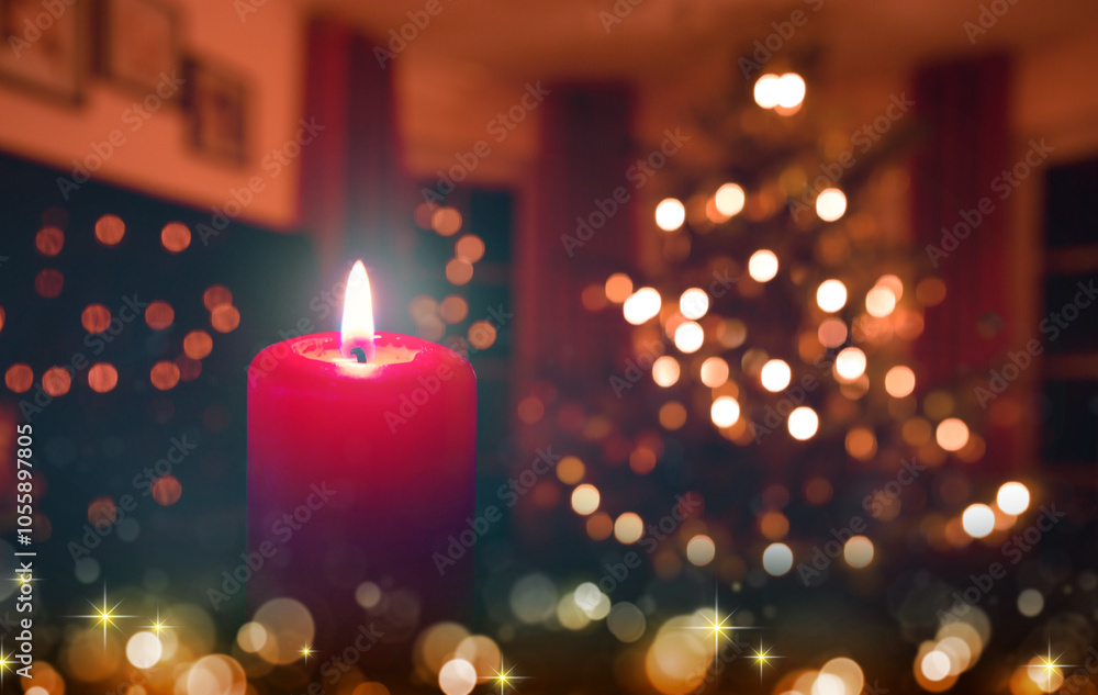 Burning red Advent candle isolated on glowing Christmas tree background. Burning red Advent candle isolated on glowing Christmas tree background.